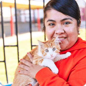 Person holding a cat